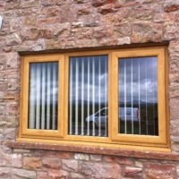 Irish Oak PVC window with 2 side openers & central fixed pane